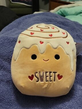 CHANEL Cream, Tan and Red Plush Cinnamon Roll Squishmallow Tag